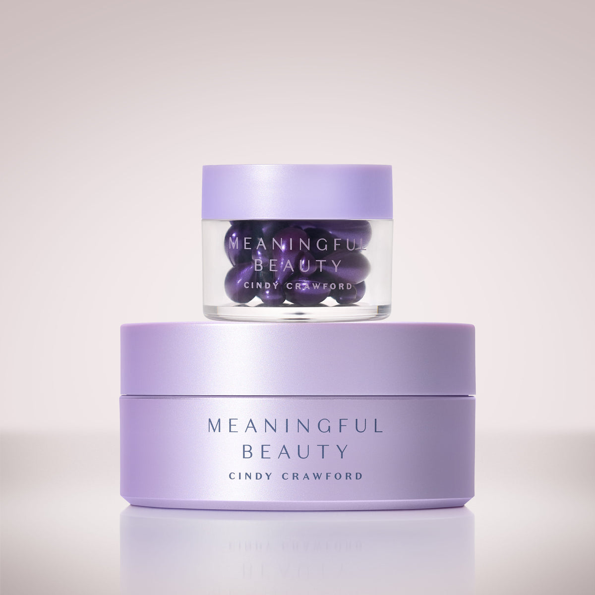 Free gift: jar of Meaningful Beauty capsules stacked on a face cream tub