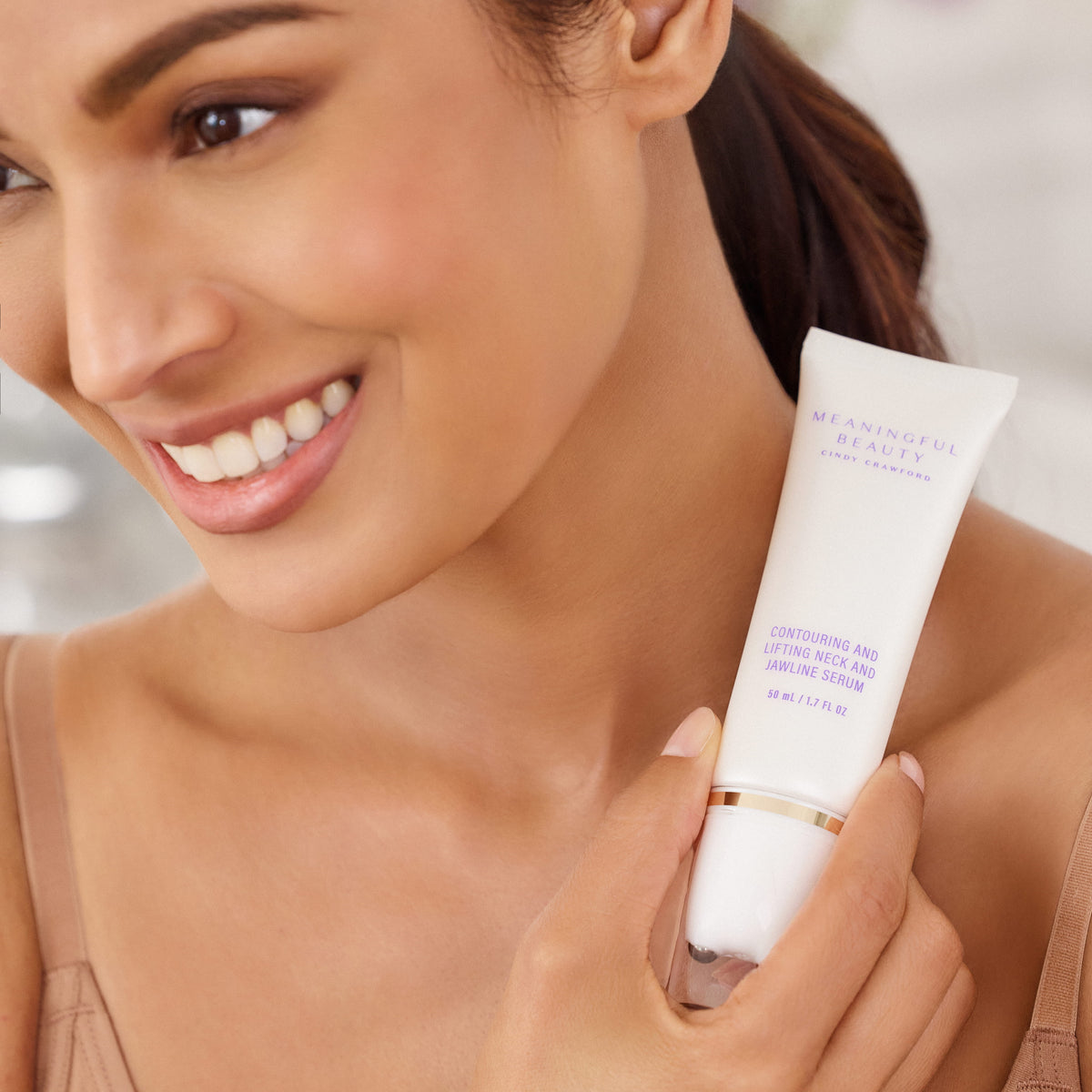 Second lifestyle photo of Contouring and Lifting Neck and Jawline Serum in use